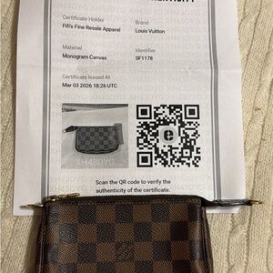 Louis Vuitton Damier Ebene mini Zip Pouch in Brown with Gold Hardware. No strap